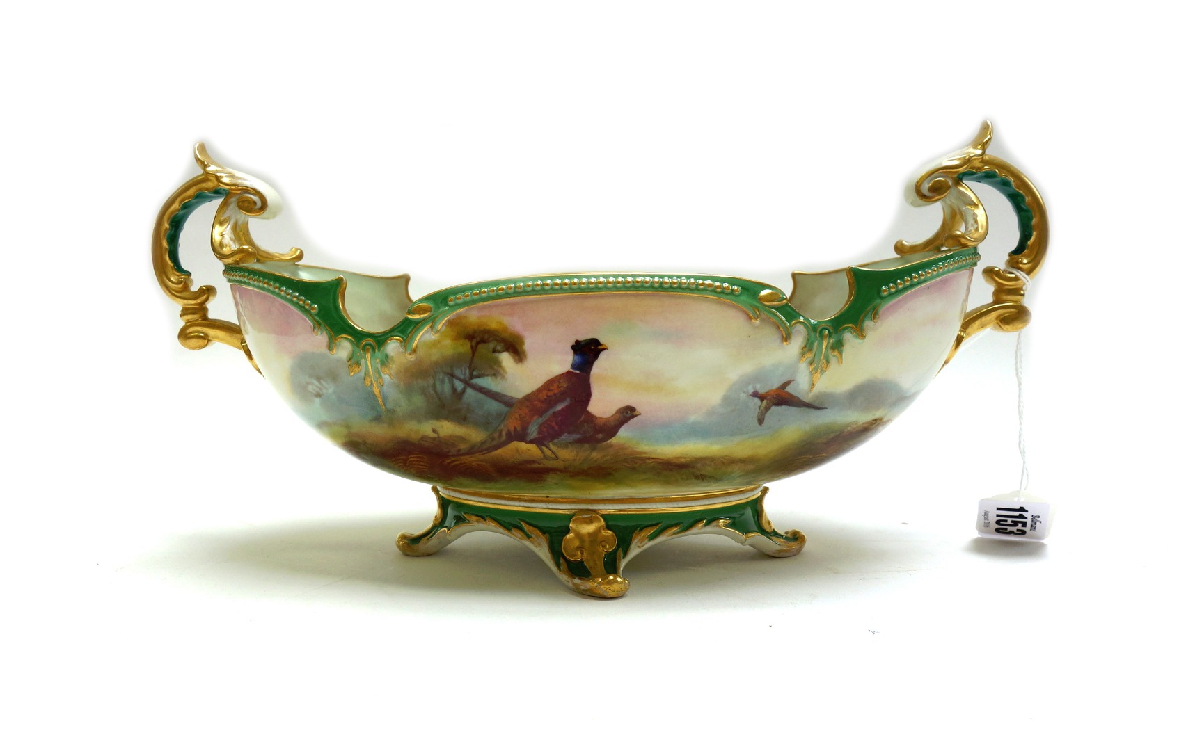 Appraisal: A Royal Worcester Hadley ware' two-handled bowl circa of shaped