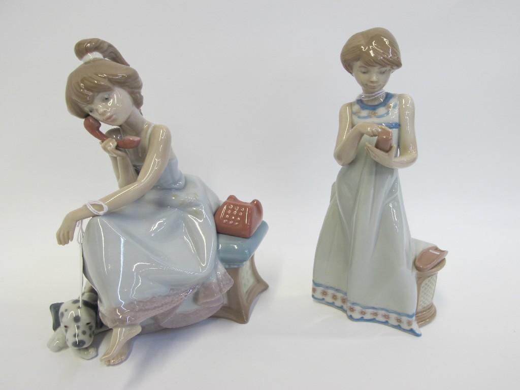 Appraisal: Two Lladro figures of girls on the telephone