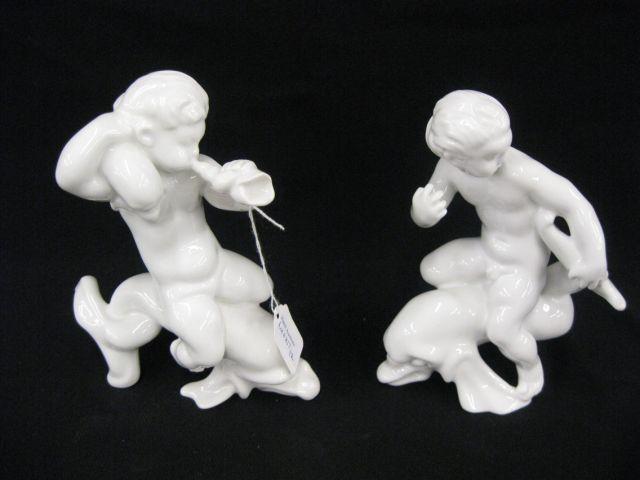 Appraisal: Pair of Bing Grondahl Porcelain Figurines of children riding dolphins