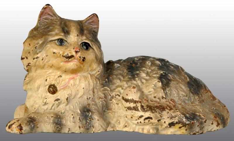 Appraisal: Cast Iron Reclining Persian Cat Doorstop Description Hubley cat Full-figure