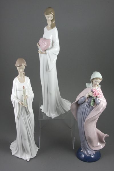 Appraisal: Group of three e Lladro figures Tallest Thumb is broken