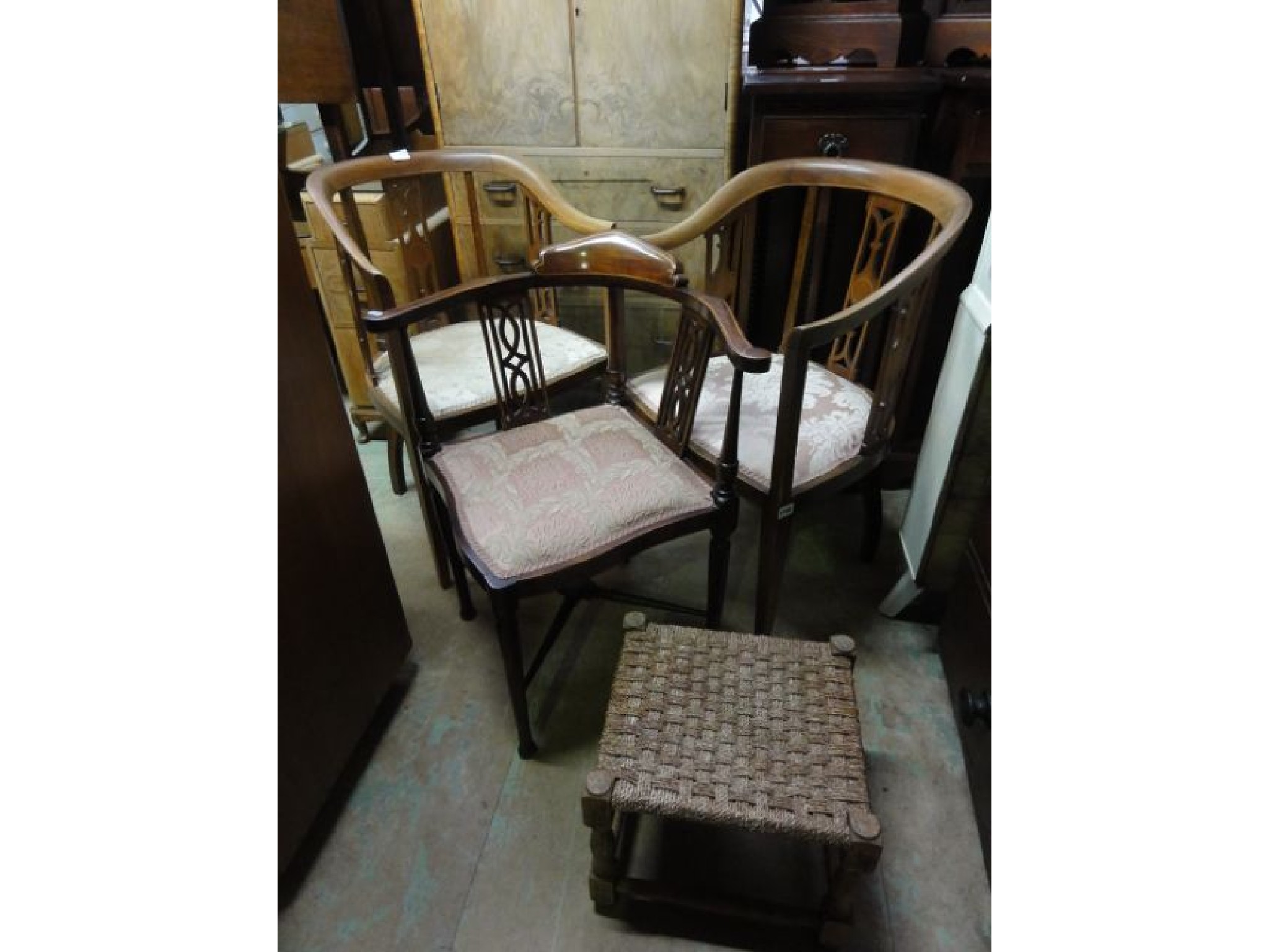 Appraisal: A pair of inlaid Edwardian mahogany lightweight tub chairs with