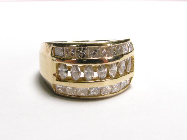 Appraisal: K Yellow gold lady's ring with three rows of marquise