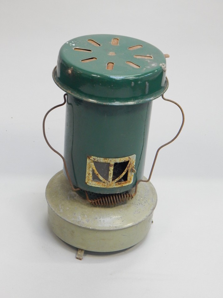 Appraisal: A Veritas Blu-heat paraffin heater with green enamelled decoration cm