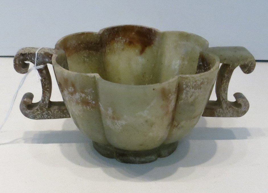 Appraisal: CHINESE CARVED ARCHAIC JADE CUP six sided scalloped cup having