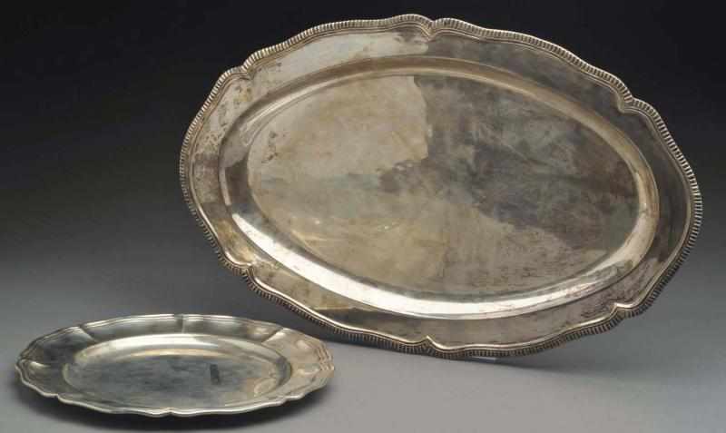 Appraisal: Two Silver Trays Both with shaped molded borders the first