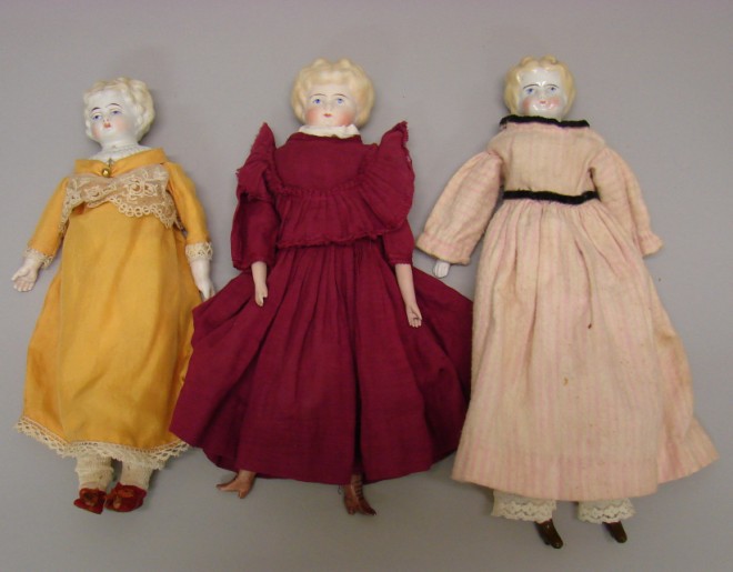 Appraisal: Lot of blonde Lowbrow dolls Parian - with molded shirtwaist