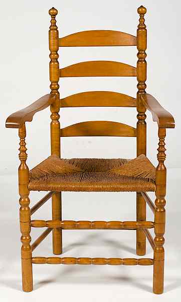 Appraisal: Ladderback Arm Chair American a ladderback arm chair in maple