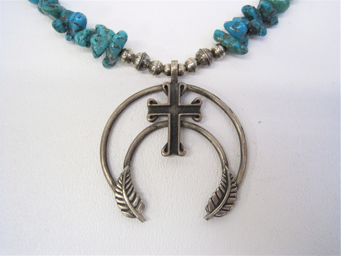 Appraisal: NAVAJO TURQUOISE AND SILVER NECKLACE composed of silver beads and