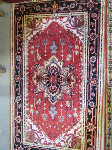 Appraisal: Heriz Persian Handmade Rug central medallion red field fine coloring