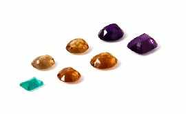 Appraisal: A collection of unset variously cut gemstones including four citrines