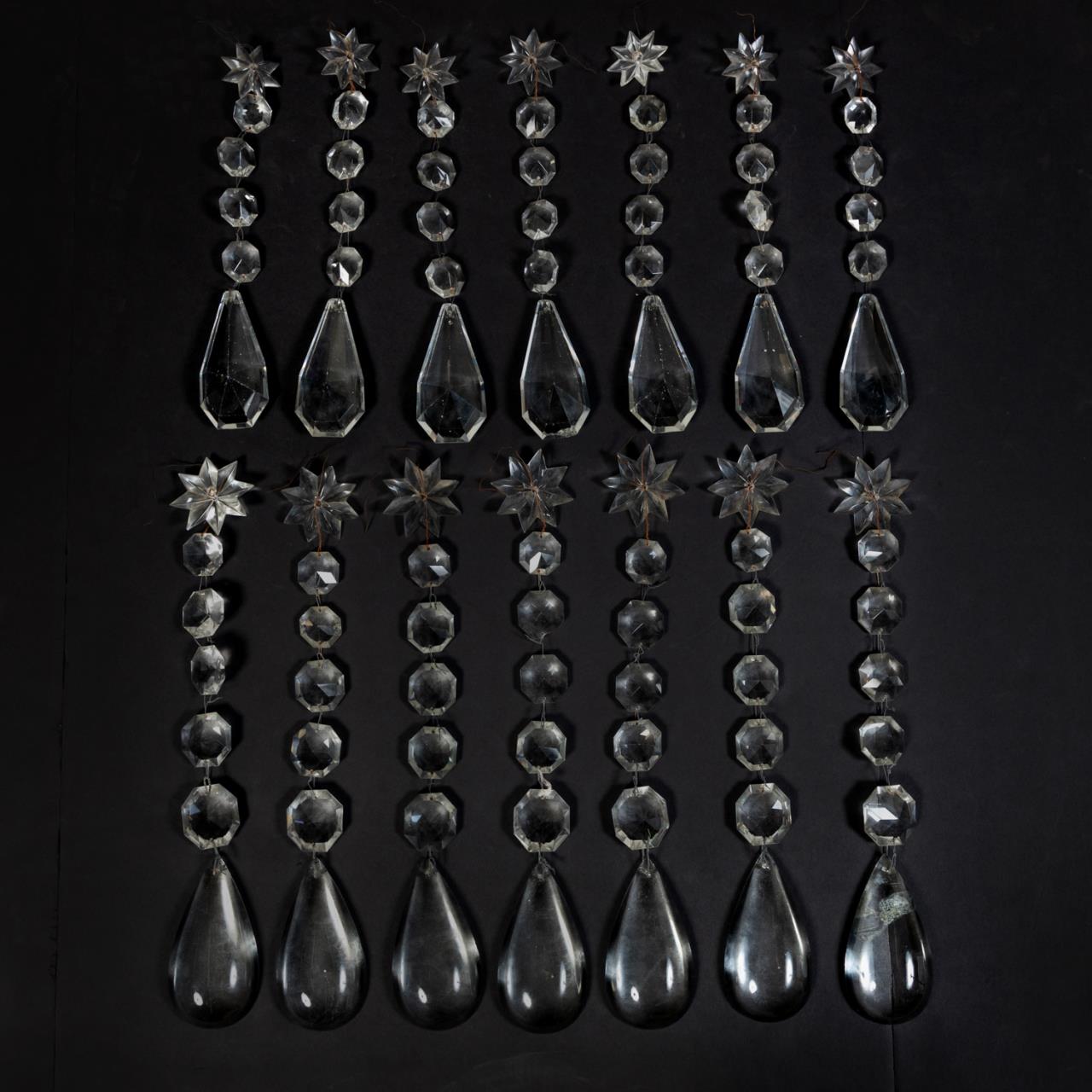 Appraisal: PC SET OF FACETED SMOOTH CHANDELIER PRISMS Set of fourteen