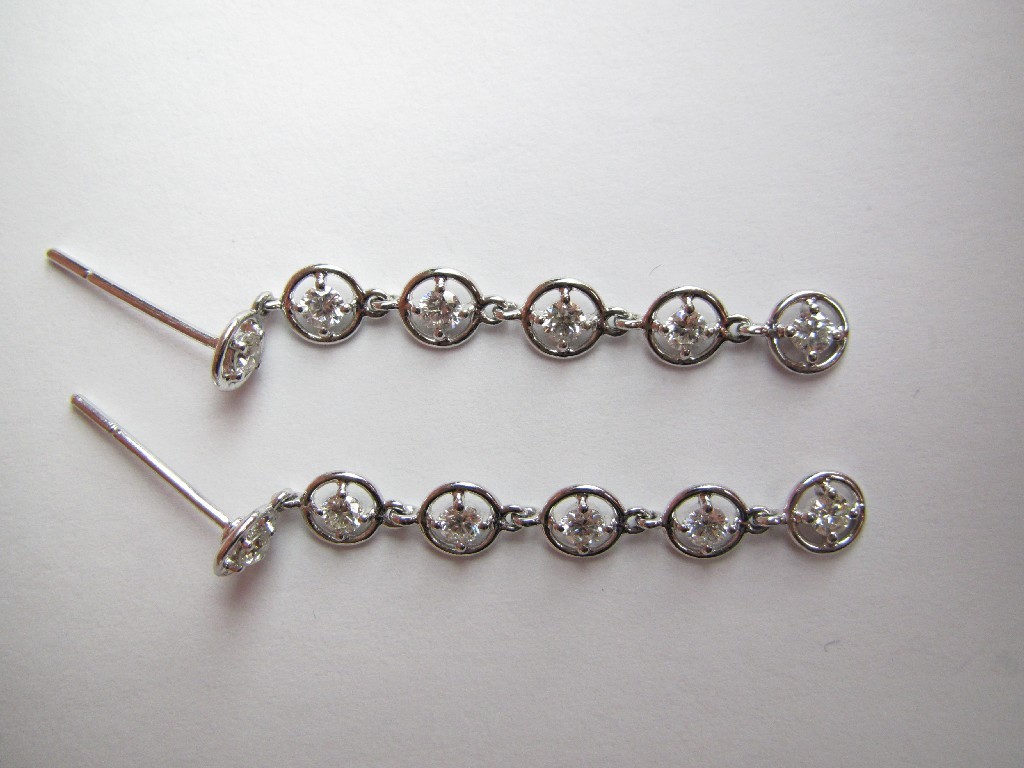 Appraisal: Pair of ct white gold diamond line earrings each with