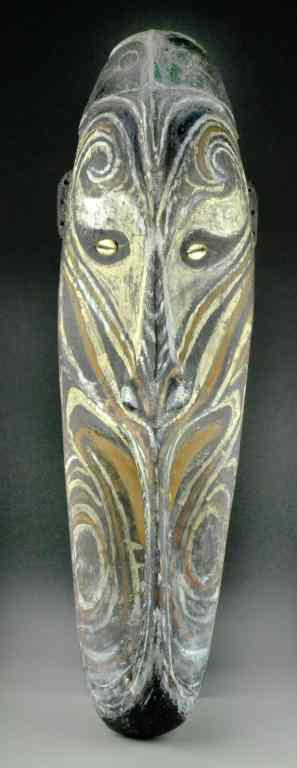 Appraisal: A Carved And Painted Oceanic Wood MaskA stylized carving fitted