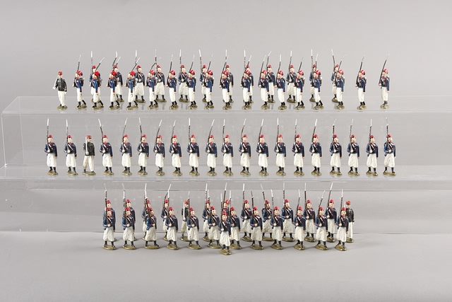 Appraisal: Lot of metal figures representing French Turcos marching with officiers