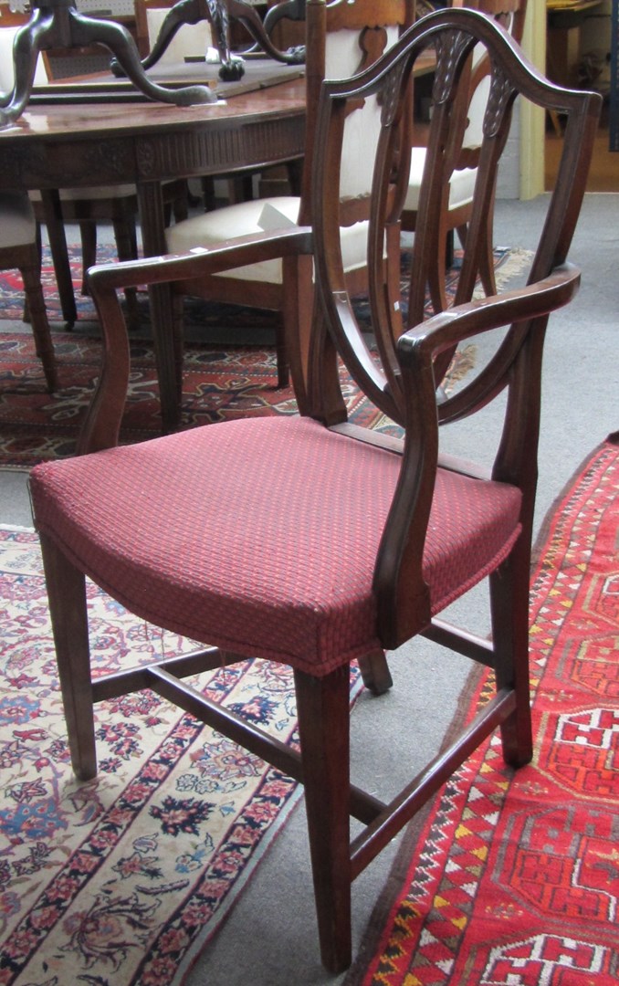 Appraisal: A set of eight George III mahogany shield back dining