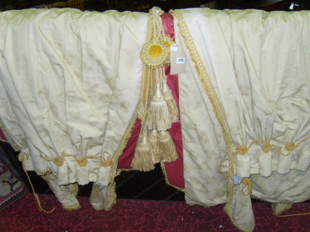 Appraisal: A collection of four pale gold Damask type curtains with