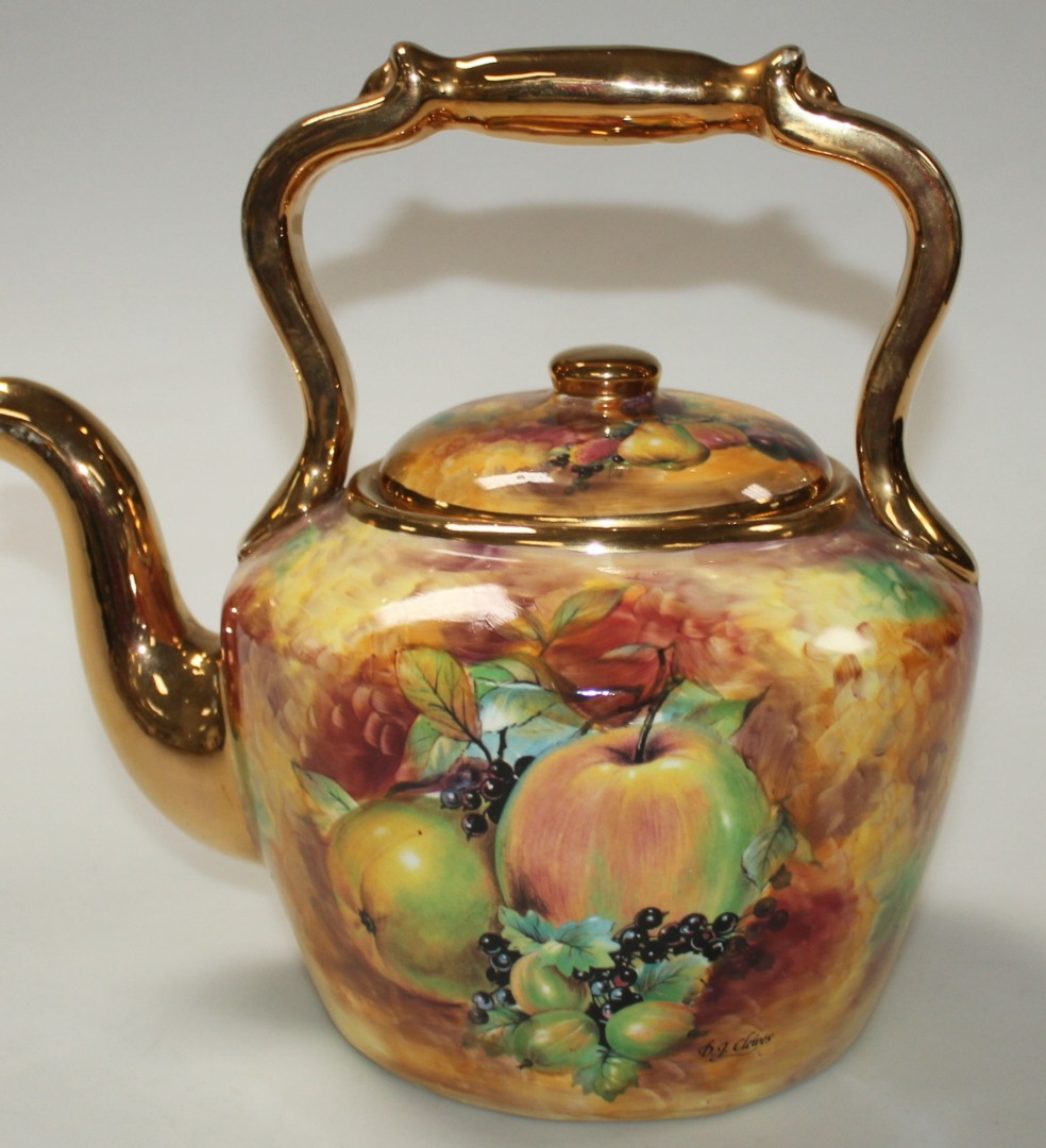 Appraisal: A thC Sovereigndale Pottery teapot the circular body decorated with