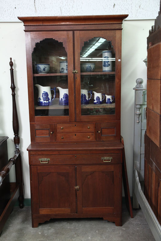 Appraisal: TWO PIECE VICTORIAN SECRETARY Walnut having a molded cornice two