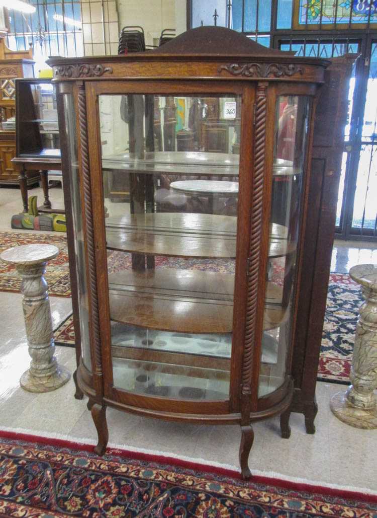 Appraisal: LATE VICTORIAN OAK AND CURVED GLASS CHINA CABINET American c