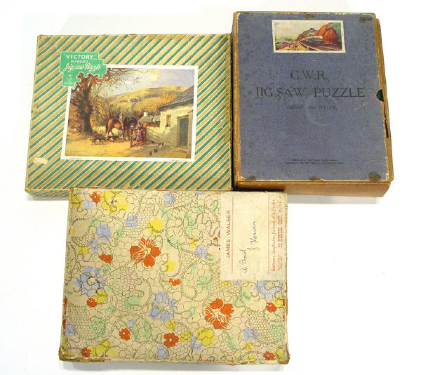 Appraisal: Three wooden jigsaw puzzles one Great Western Railways another floral