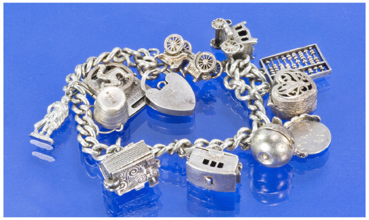 Appraisal: Silver Charm Bracelet Loaded with charms All fully hallmarked