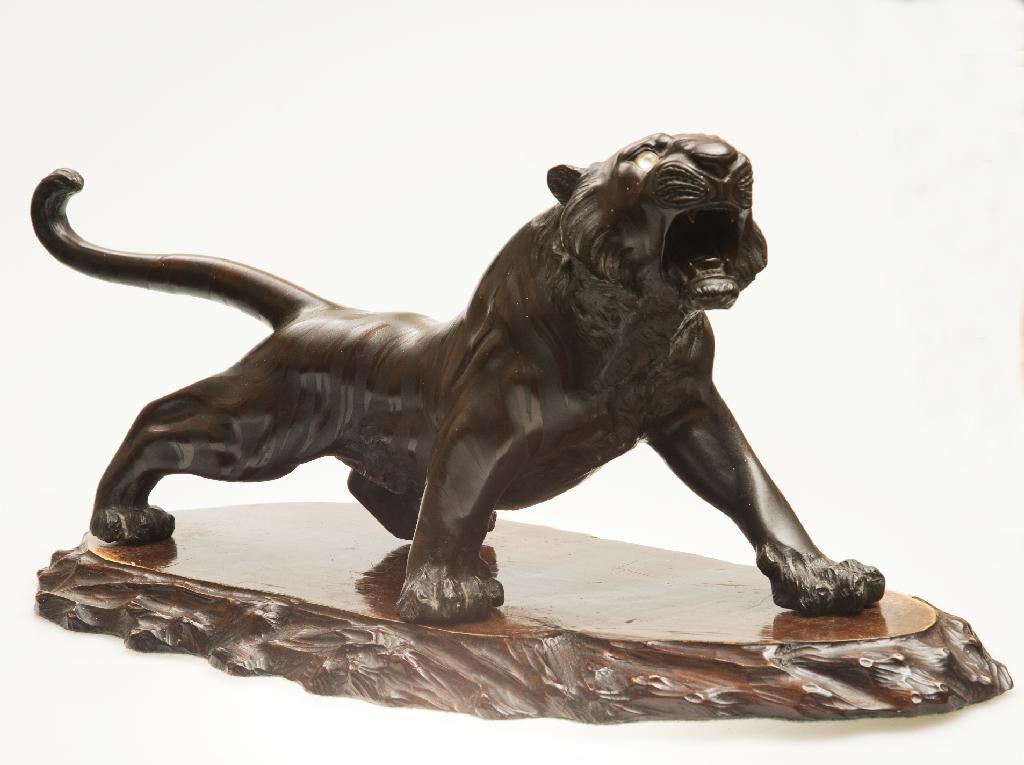 Appraisal: JAPANESE BRONZE MODEL OF A SNARLING TIGER MEIJI PERIOD with