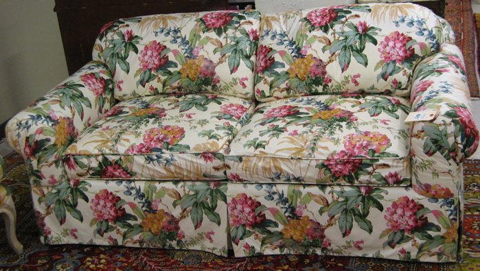 Appraisal: TRADITIONAL STYLE FLORAL CHINTZ SOFA American recent production with overall