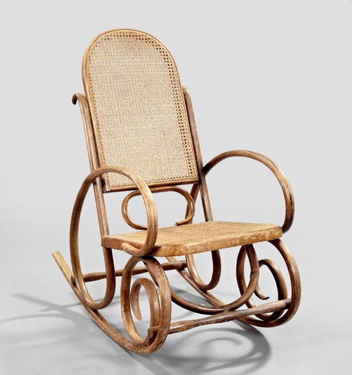 Appraisal: Thonet-Style Bentwood and Caned Rocking Chair early th century having