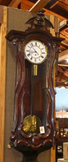 Appraisal: Austrian walnut regulator clock having a molded top above a