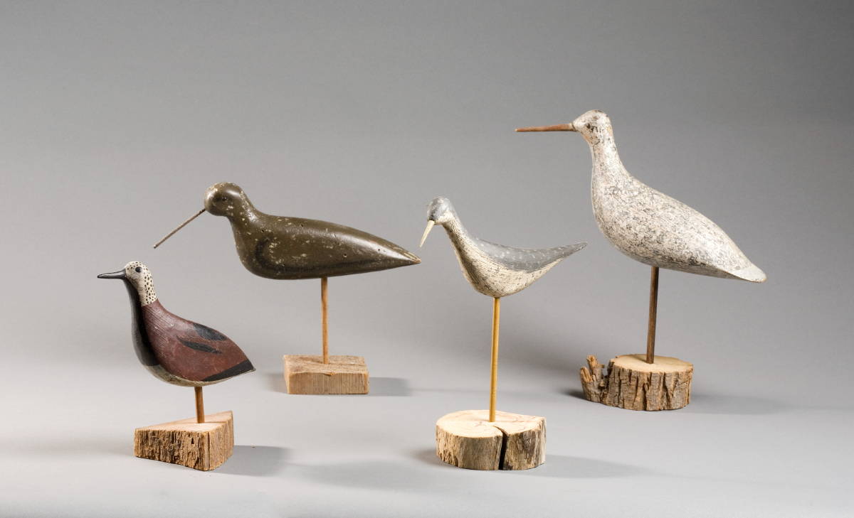 Appraisal: FOUR CARVED AND PAINTED SHOREBIRD DECOYS Length of largest inches