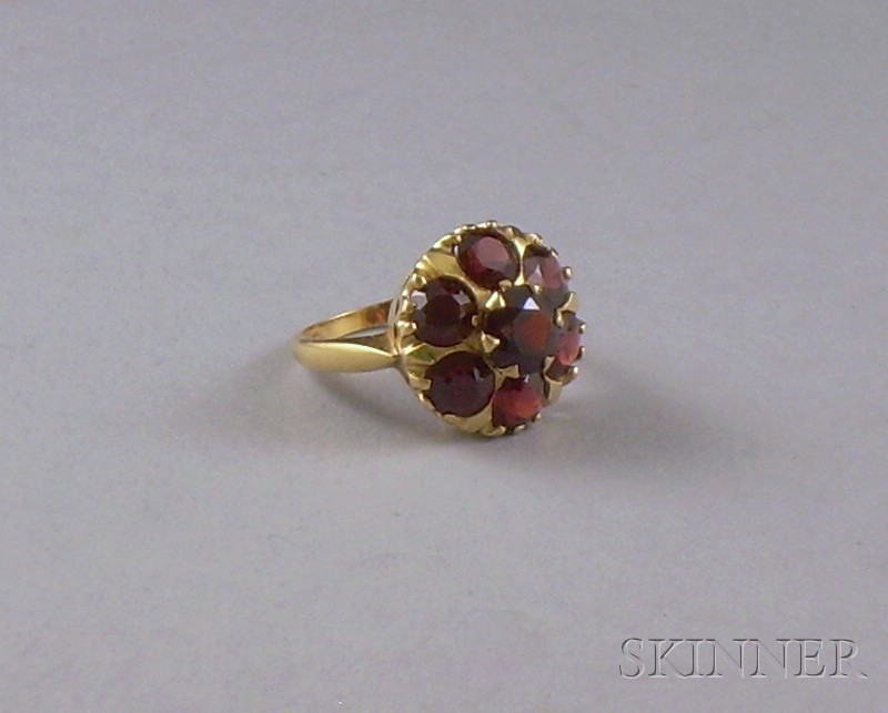 Appraisal: kt Gold and Garnet Floriform Ring size