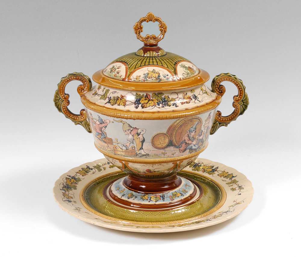 Appraisal: METTLACH PUG PUNCH BOWL AND UNDER PLATE Punch bowl with