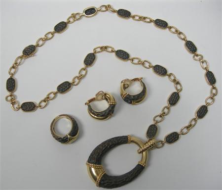 Appraisal: BOUCHERON - a 's ct gold and bronze suite comprising