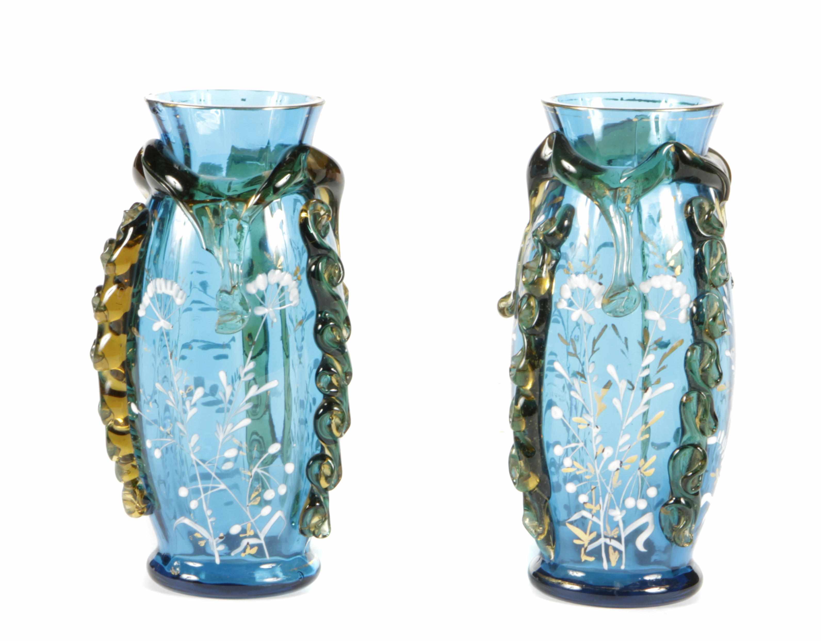 Appraisal: A pair of Continental turquoise enamel decorated glass vases with