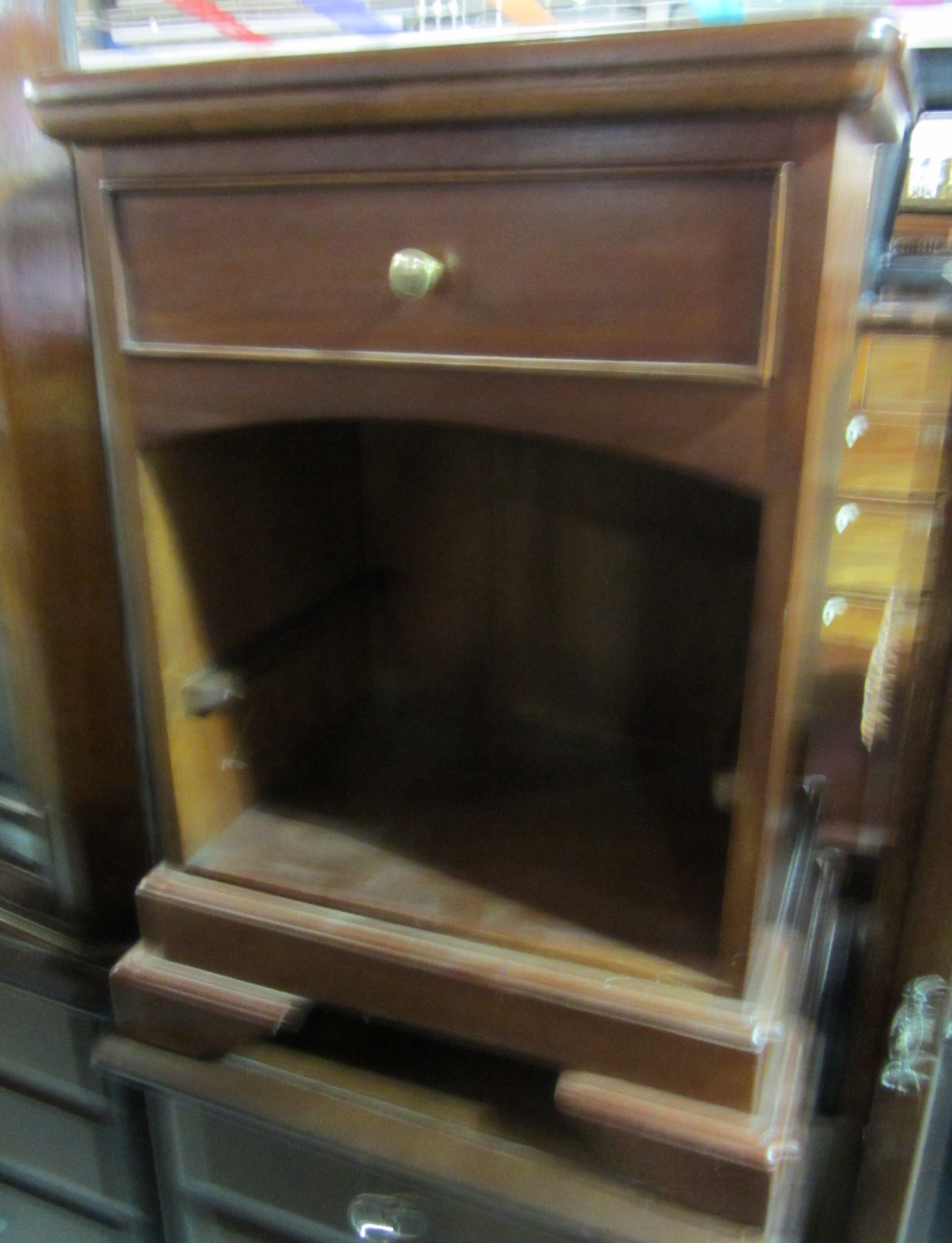 Appraisal: A th century mahogany bedside table together with a th