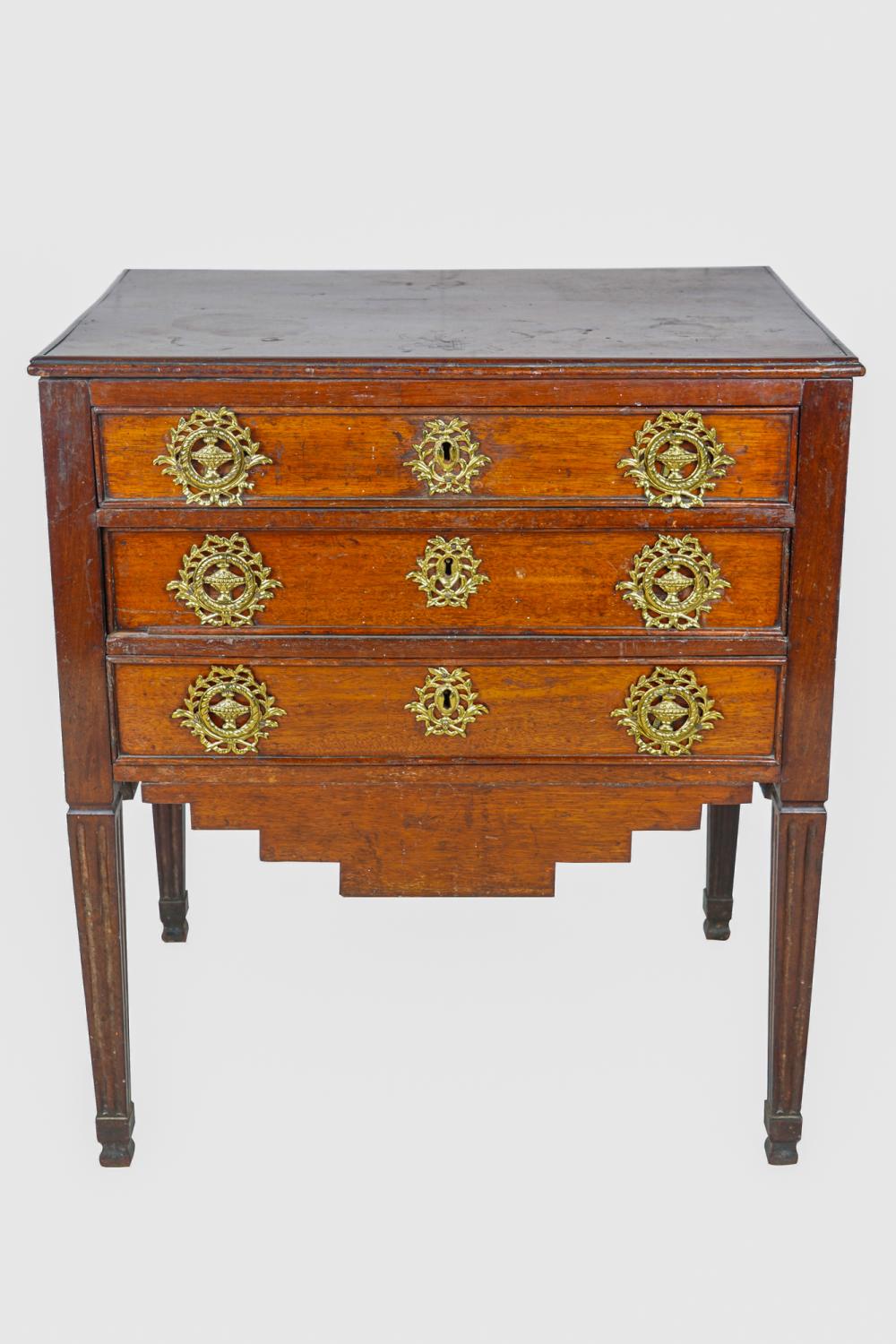 Appraisal: NEOCLASSICAL STYLE MAHOGANY PETITE COMMODEhaving three drawers Condition with wear