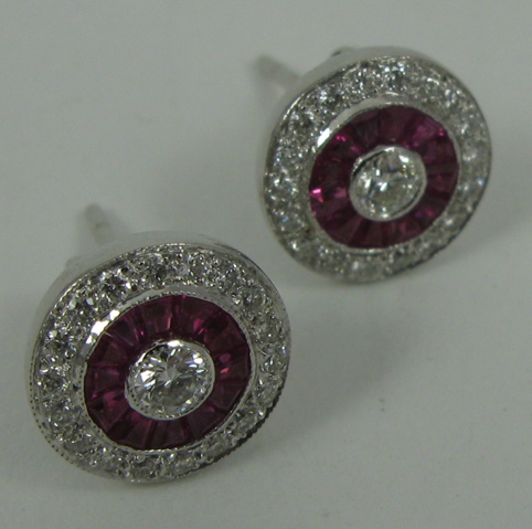 Appraisal: PAIR OF RUBY DIAMOND AND WHITE KARAT GOLD EARRINGS each