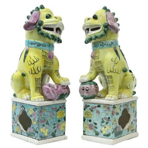 Appraisal: pair Chinese polychrome enameled porcelain foo lions comprising male with