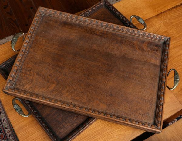 Appraisal: TWO ST DUNSTAN OAK SERVING TRAYS C Signed on the