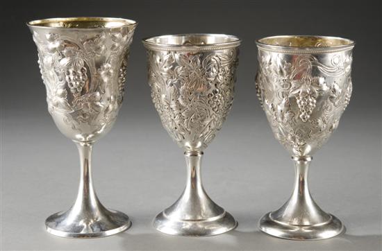 Appraisal: Group of three American sterling repousse goblets All with similar