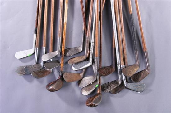 Appraisal: GROUP OF EIGHTEEN WOOD SHAFT GOLF IRONS INCLUDING A PLAIN