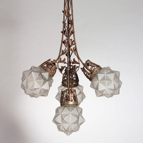 Appraisal: FRENCH ART DECO Hand-forged iron chandelier with reticulated frame and