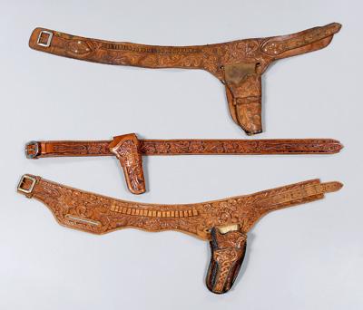 Appraisal: Three tooled leather belts holsters one marked quot S D