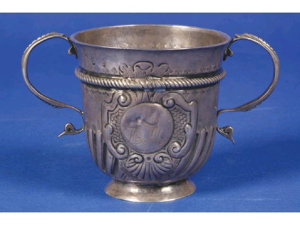 Appraisal: A BRITANNIA STANDARD QUEEN ANNE PORRINGER of circular form with