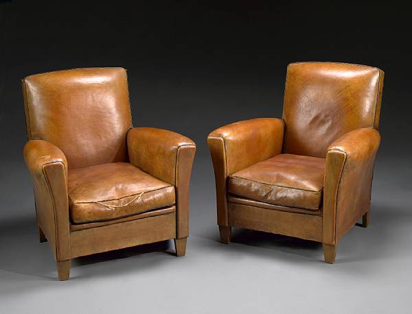 Appraisal: A pair of French Art Deco leather upholstered armchairs second