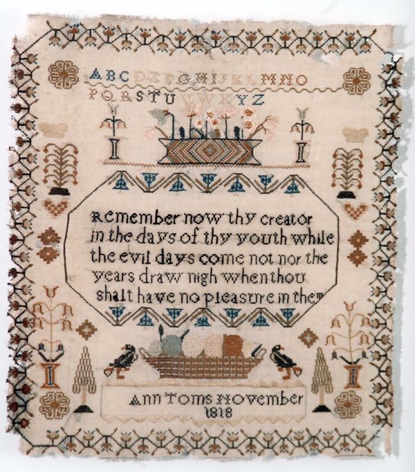 Appraisal: An English needlepoint sampler Silk on linen With alphabet and