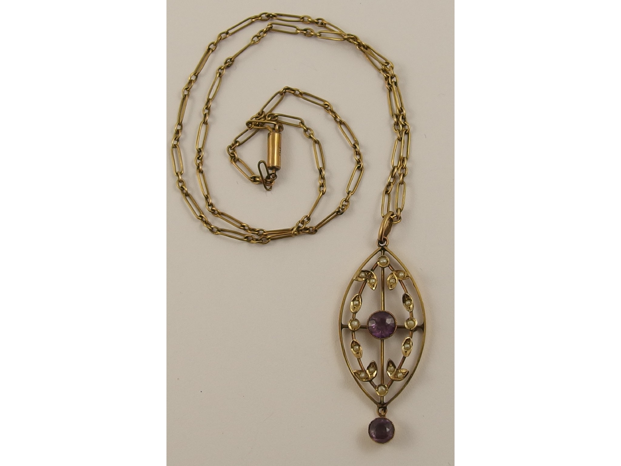 Appraisal: A ct Edwardian pearl and amethyst pendant and chain