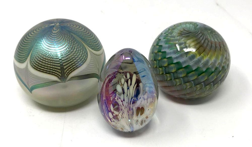 Appraisal: Three Art Glass Iridescent Paperweights Lot Three Art Glass Iridescent