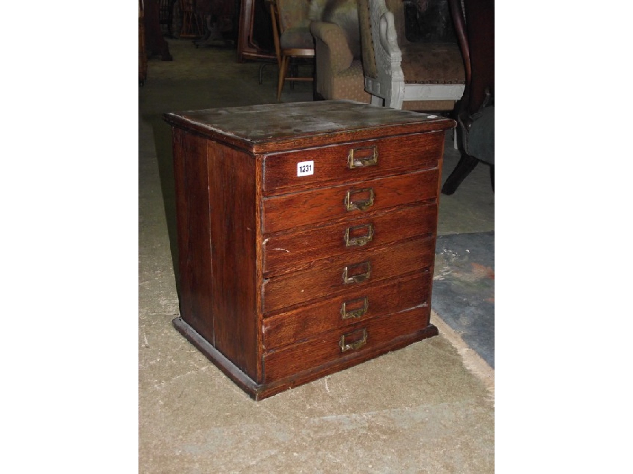 Appraisal: An Edwardian oak nest of six index filing drawers